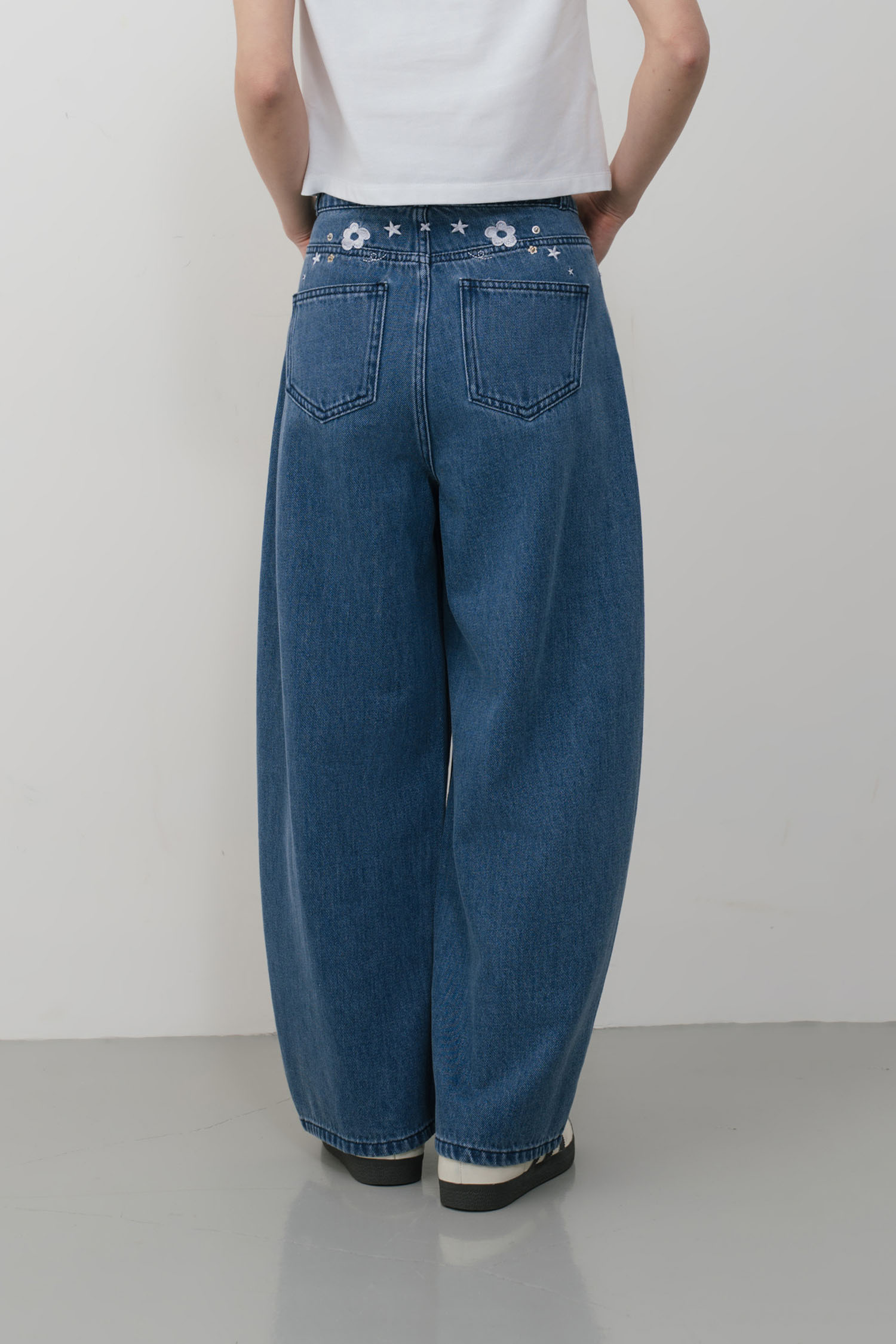 花花世界彎刀牛仔褲